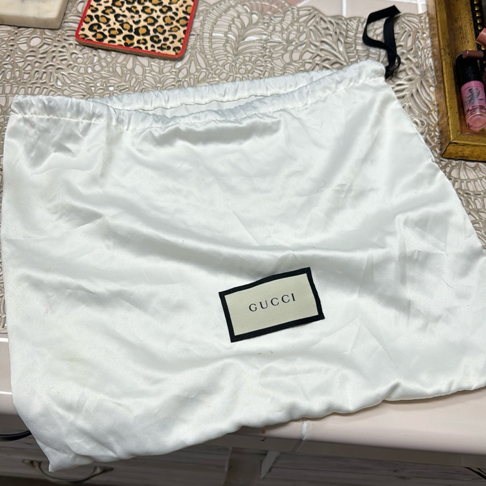 Gucci silk dust bag. 14” x 12” tall. Excellent condition/ never used.